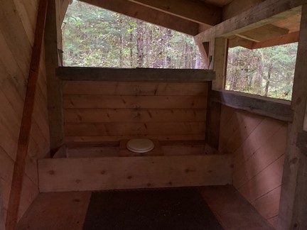 The inside of the 8 x 12-foot outhouse. You just can’t beat the approach or the view. 